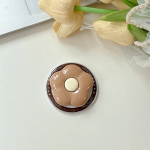 Macro shot of coffee-colored flower phone grip with 'Gift For You' decorative base text