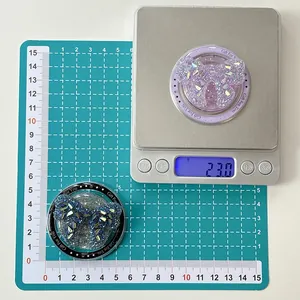 Detailed view of glittery butterfly phone grips weighing 23g with scale measurements