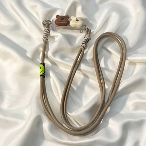 Adjustable crossbody phone strap with cute bear bracket on white silk background
