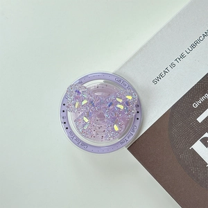 Detail of purple glitter butterfly phone grip with Gift For You text on white background