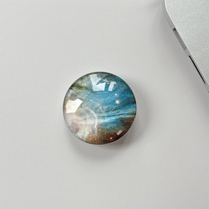 Macro detail of starry sky phone grip with diamond-cut crystal glass surface
