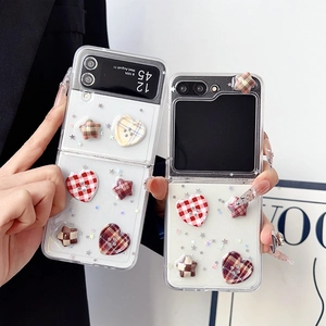 Samsung Galaxy Z Flip phone case featuring 3D heart buttons and sequin grid pattern