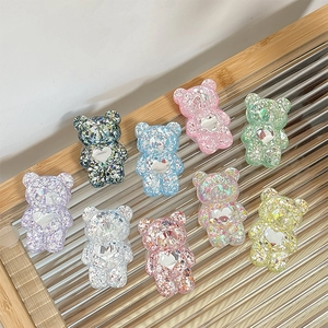 Support de téléphone ours pailleté avec sequins colorés et détail cœur en relief