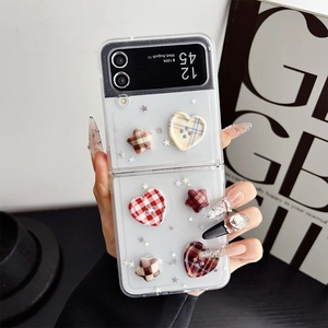 Detail of transparent Z Flip case with 3D plaid heart and star shaped buttons
