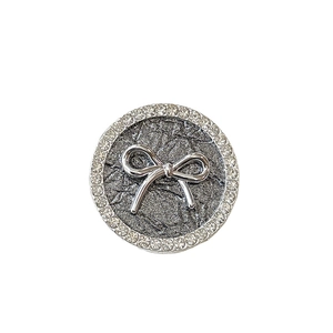Silver round phone grip holder with sparkling rhinestones and a 3D bow design