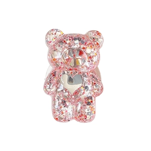 Support de téléphone ours rose avec paillettes scintillantes et détail en forme de cœur