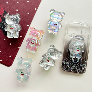 3D laser bear phone grip with cherry pattern on white leather background