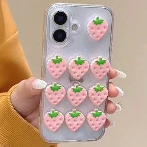 Close-up of 3D pink resin strawberries and glitter texture on clear iPhone case