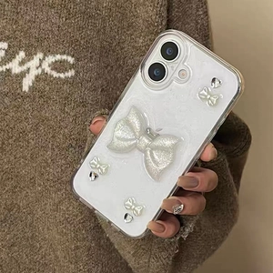 Detail of glitter phone case with 3D white bows and silver heart sequins for iPhone