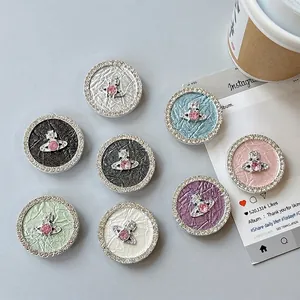Sparkling rhinestone planet phone socket stand in eight assorted colors on desk