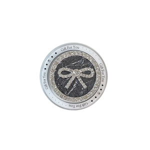 Luxury round phone socket grip featuring a rhinestone bow and black glitter finish