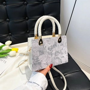 Elegant Chinese style crossbody handbag with jacquard pattern and woven handle