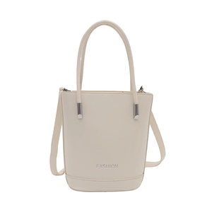 Minimalist beige bucket bag with fashion print and adjustable strap in white background