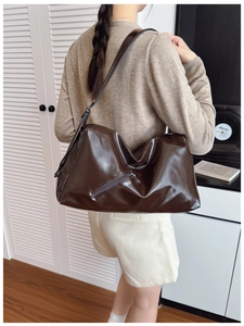 Deep brown large tote bag in shiny faux leather with front zipper pocket detail
