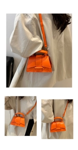 Vues détaillées d'un mini sac à main orange vif en forme de sablier à base courbée
