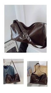 Close-up of brown oiled leather tote bag with long shoulder strap and zipper detail