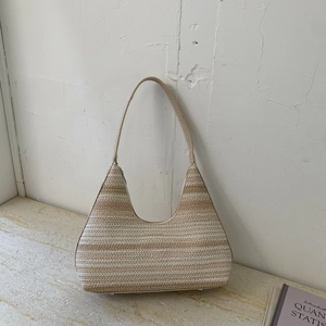 Striped woven hobo bag with large capacity in beige and brown for summer beach vacation