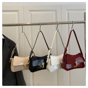 Multiple colors of gloss finish faux leather shoulder bags with gold oval metal buckles