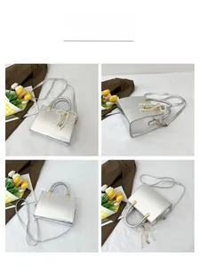 Detailed views of silver textured handbag with pearl bow charm and crossbody strap
