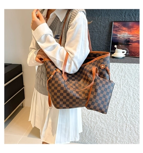 Detail shot of vintage tote bag set with checkered pattern and matching coin purse