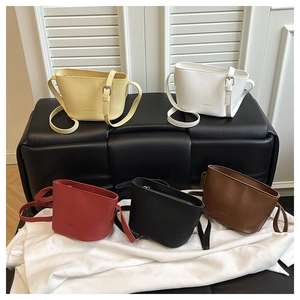 Mini lychee texture bucket bags in five colors with adjustable straps and fashion logo