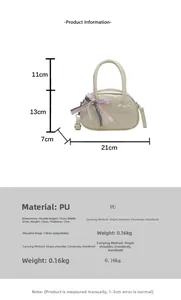 Detailed size chart of cream mini handbag with bow detail and adjustable shoulder strap