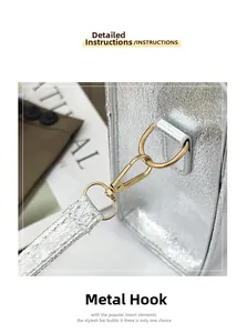 Detailed close-up of golden hardware hook and silver cracked texture leather bag