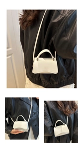 Detailed views of a white crocodile embossed mini hourglass bag with curved base