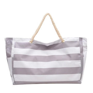 Large striped canvas tote bag with nautical hemp rope handles for beach and travel use