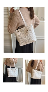 Close-up of botanical embroidery and geometric patterns on a white tote bag detail