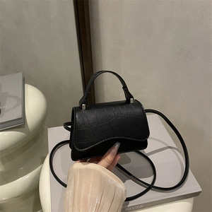 Elegant black crocodile pattern square handbag with top handle and shoulder strap