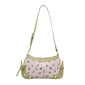 Chic white shoulder bag with cherry print and green leather trim on white background