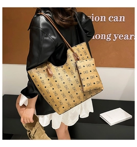 Detail view of large tote bag and matching pouch with vintage bear and diamond print