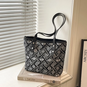 New Chinese style black tote bag with white geometric floral patterns and leather straps