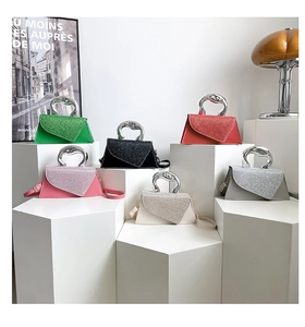 Detail of color variety for trapezoidal handbags with stylish silver metal handles