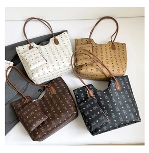 Detailed set of retro monogram tote bags and matching pouches in four classic colors
