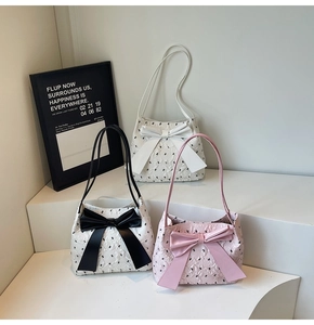 Detailed comparison of three bow-knot tote bags in white, pink, and cream jacquard fabric