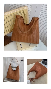 Détails du sac hobo tressé marron montrant sa grande capacité pour laptop et voyage