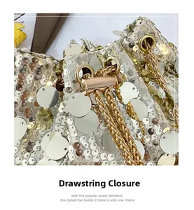 Close-up of golden sequins and drawstring metal chain on this elegant evening bucket bag
