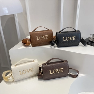 Chic quilted crossbody bags in four colors with gold LOVE lettering and wide straps