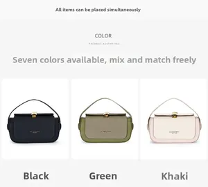 Detailed view of luxury box bags in black, green, and khaki with gold metal buckles