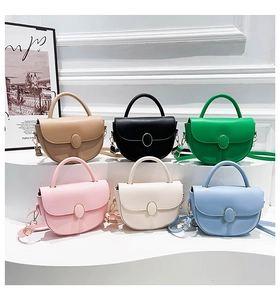 Multi-color saddle bags collection showing leather texture and gold hardware details