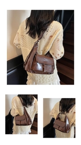 Détails du sac à bandoulière en cuir verni marron foncé avec finitions argentées sur mannequin