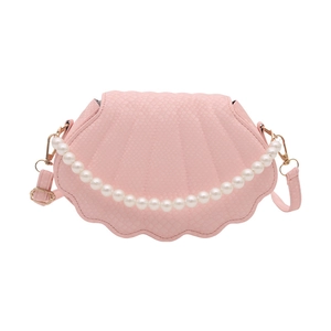 Pink shell shaped crossbody bag with pearl chain handle and snakeskin texture