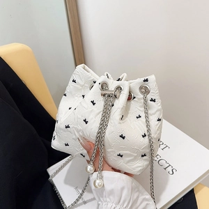 Fashionable pleated white hobo bag with bow patterns, pearl charms and silver chain strap