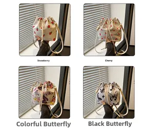 Detailed grid showing four bucket bags with strawberry, cherry and butterfly prints