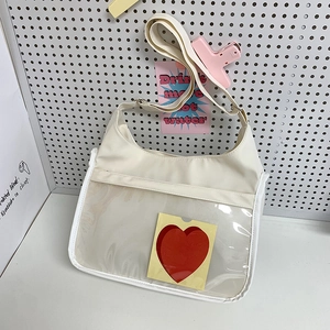 Beige messenger bag with large clear PVC window and adjustable wide shoulder strap