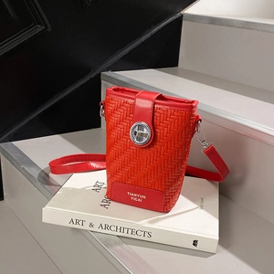 Elegant red woven bucket bag with silver twist lock and slim shoulder strap for women