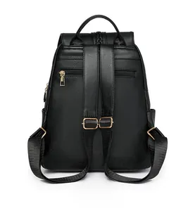 Detail of backpack back showing anti-theft zipper pocket and gold hardware