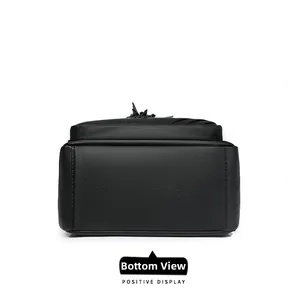 Detailed view of the flat rectangular base with lychee textured leather and neat stitching